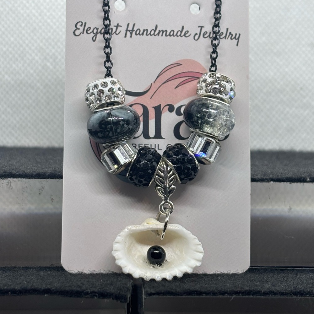 Elegant Black and Silver Beaded Necklace by [Brand]